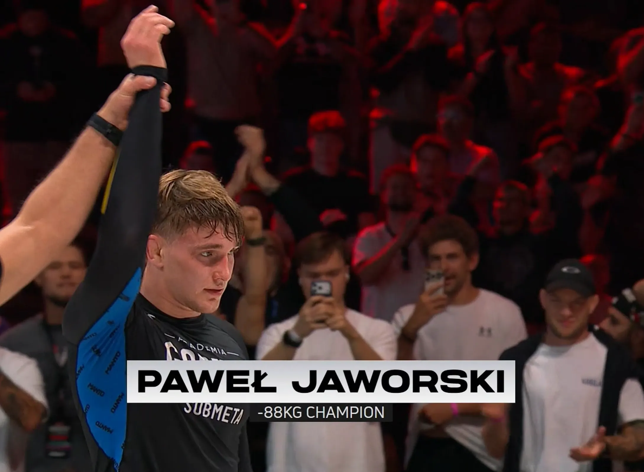 Paweł Jaworski gets his hand raised in the -88 kg division
